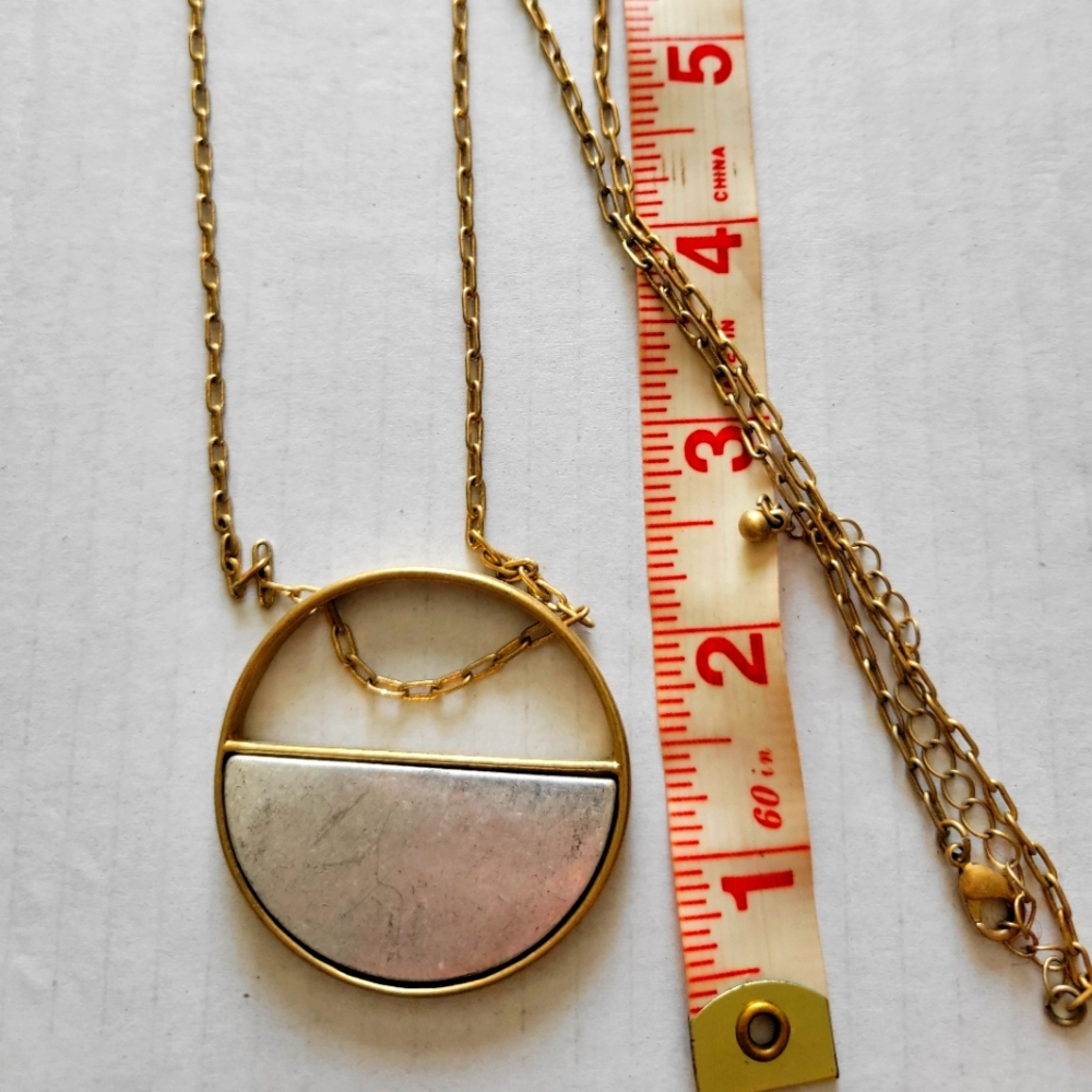 Elegant Gold and Silver Pendant Necklace